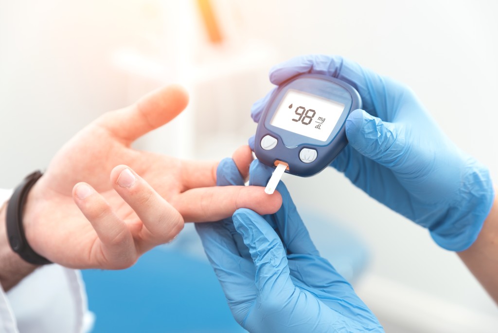 Diabetes Awareness Month -someone has their finger pricked